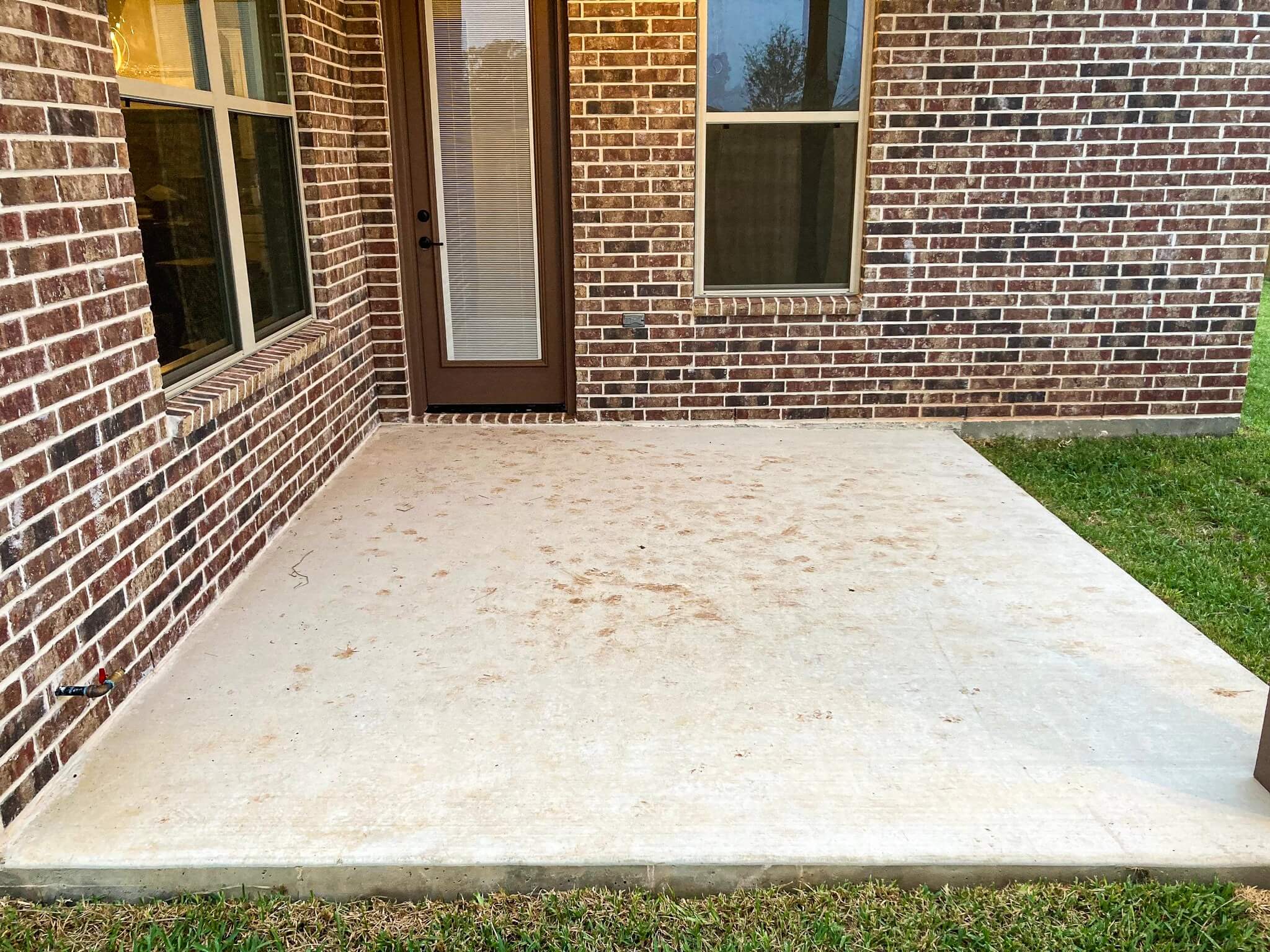 Bare concrete patio before Herd Coatings
